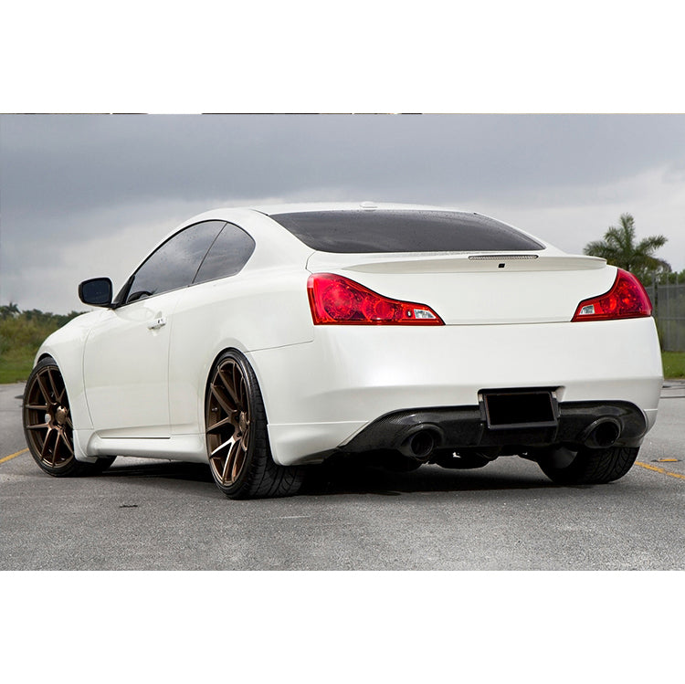 white Nissan skyline 370gt coupe with aftermarket carbon diffuser